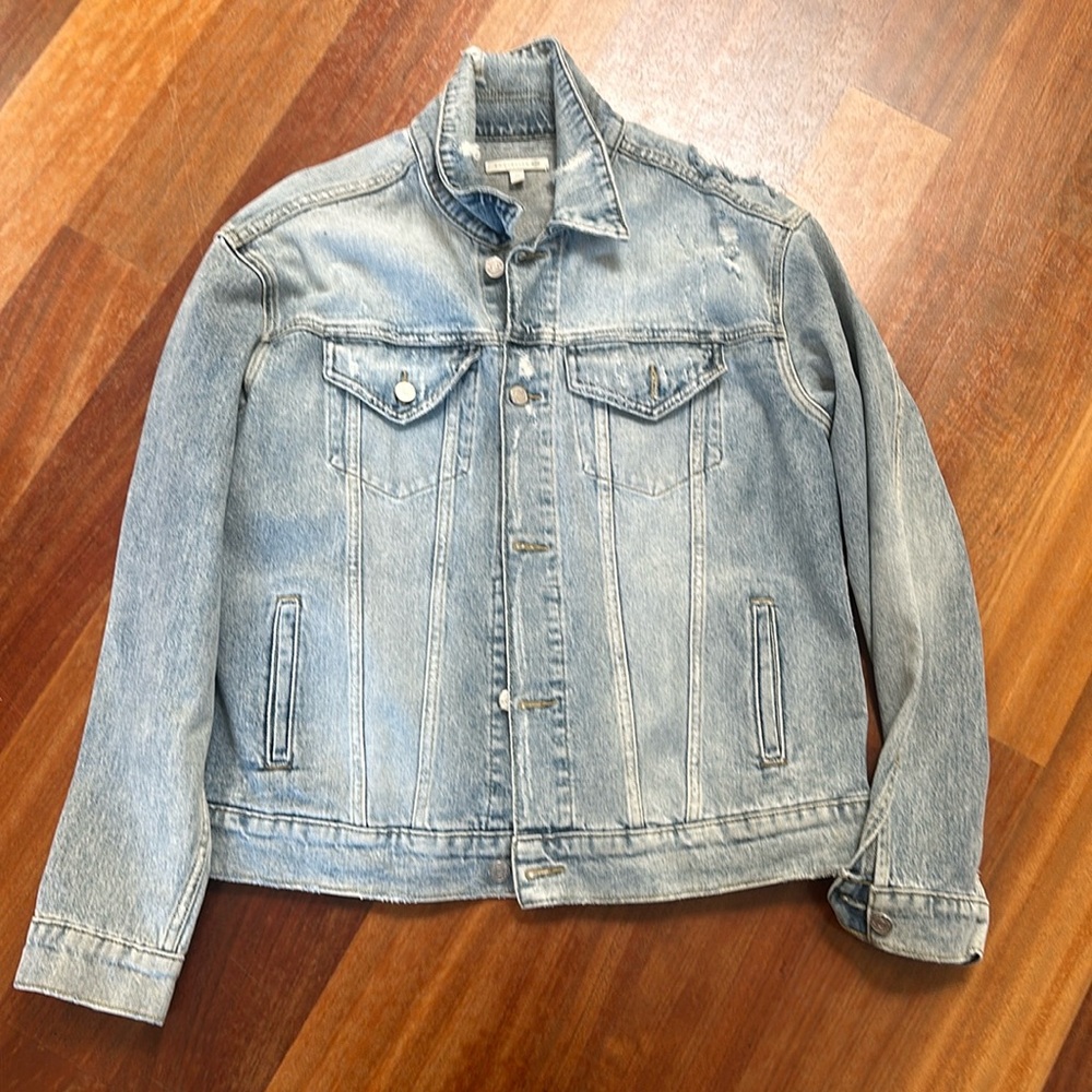 SOCIALITE DENIM JACKET. NEVER WORN. LIGHT COLOR WITH WORN IN RIPS. SIZE MEDIUM